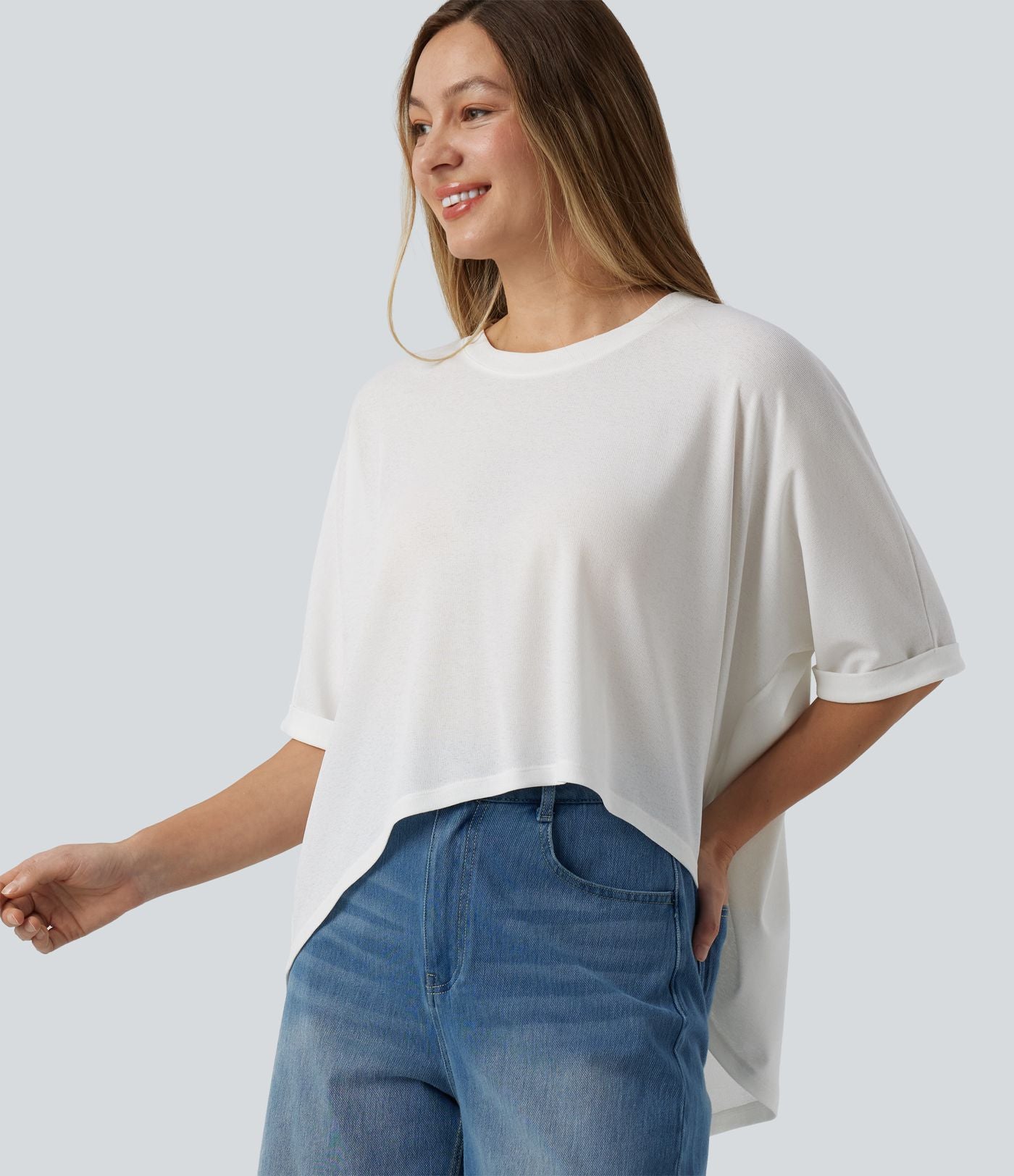 T-shirt décontracté col rond manches mi-longues ourlet asymétrique