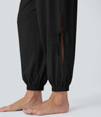 Combinaison de yoga col bateau sans manches dos nu avec découpes et poches latérales à cordon de serrage effet frais InstantCool, protection solaire UPF50+