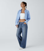 Halara Flex™ Jean large asymétrique taille basse avec bouton, fermeture éclair et poches multiples, délavé et extensible en maille