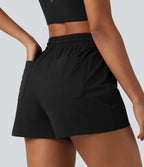 Short de sport baggy taille haute extensible en popeline avec cordon de serrage et poches