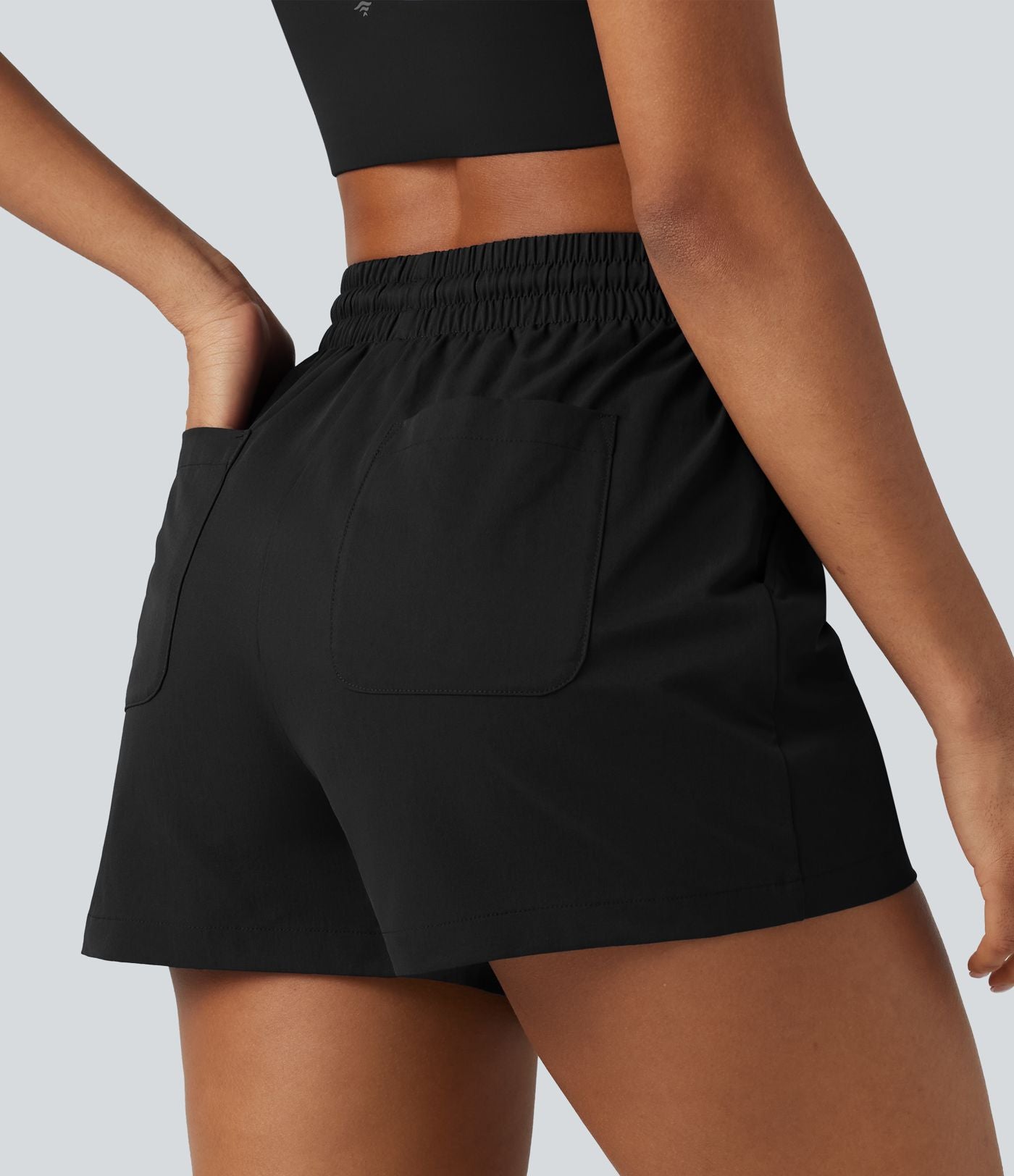 Short de sport baggy taille haute extensible en popeline avec cordon de serrage et poches