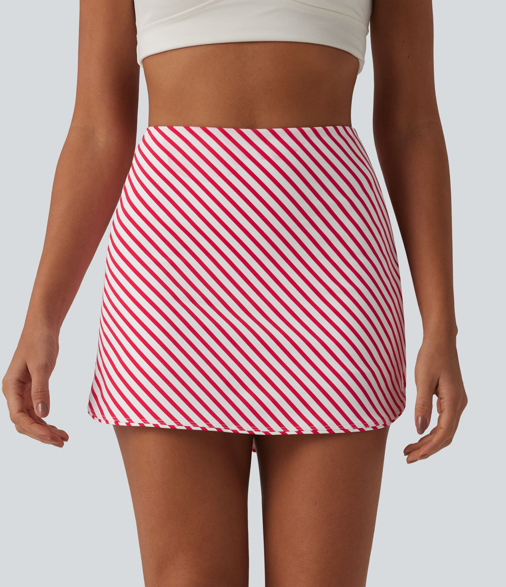 Jupe mini de tennis 2-en-1 à rayures taille haute avec ourlet arrondi et poches