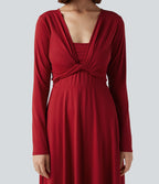 Robe mi-longue deux pièces à manches longues effet cache-cœur avec nœud au dos et poches