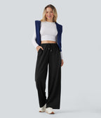 Pantalon de yoga tissu gaufré taille mi-haute jambe droite avec cordon de serrage et poches