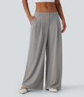 Pantalon décontracté taille basse à jambes larges en tissu gaufré avec poches latérales