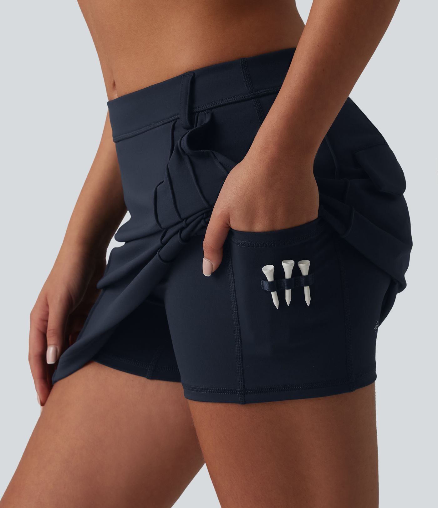 Jupe mini trapèze de golf 2-en-1 taille mi-haute avec poches