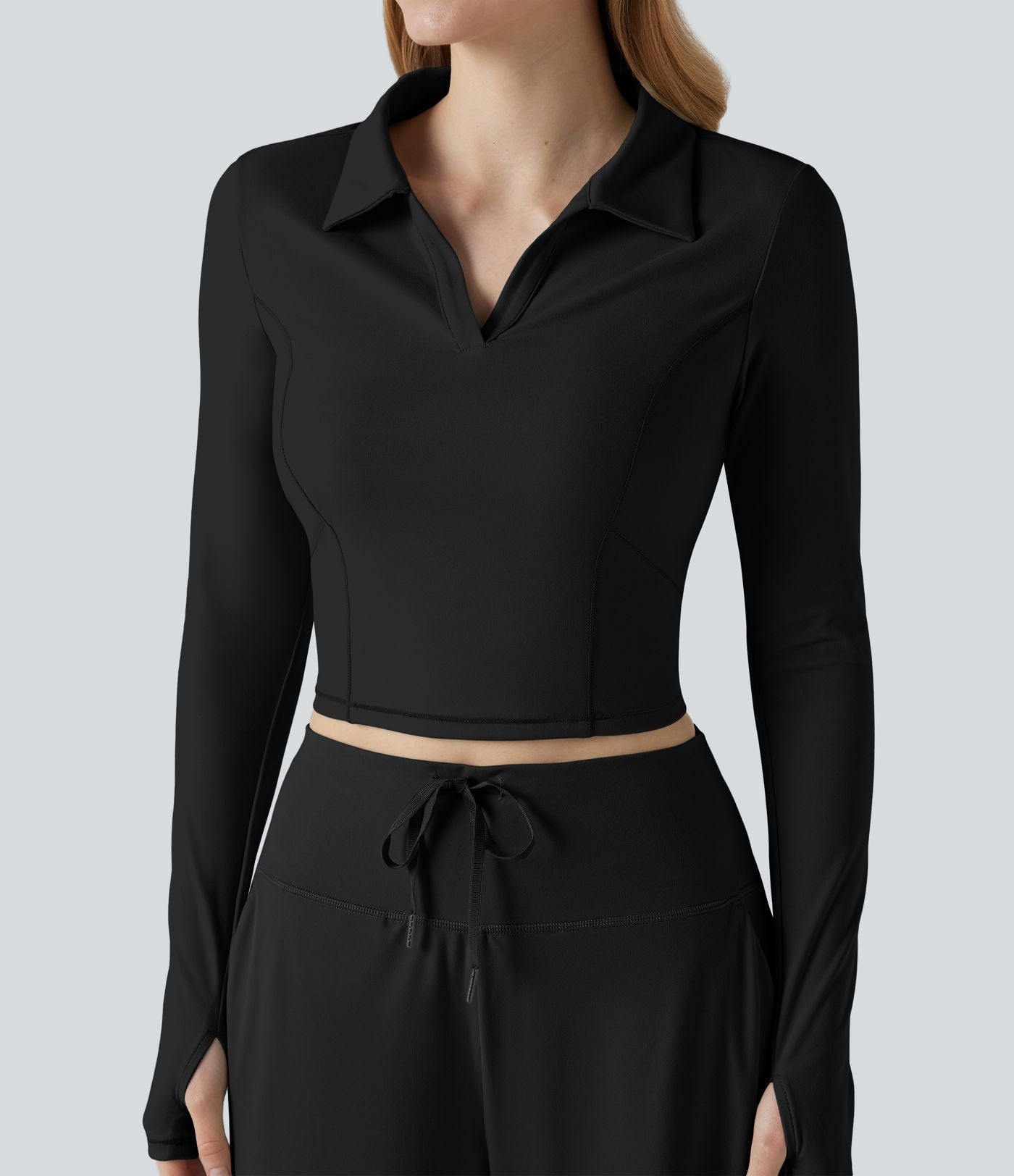Top de sport tennis SoftlyZero™ Plush court col polo manches longues avec trous pouces