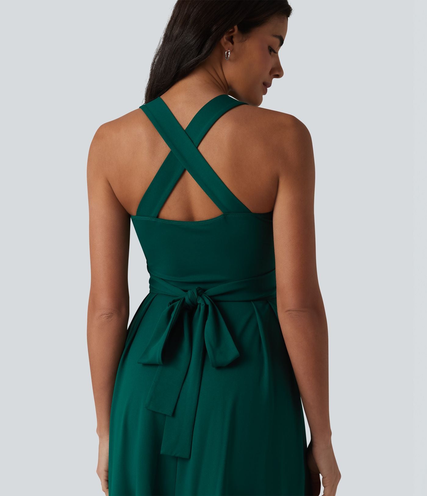 Robe midi fluide sans manches décolleté cœur avec bretelles croisées, nœud dans le dos et poches