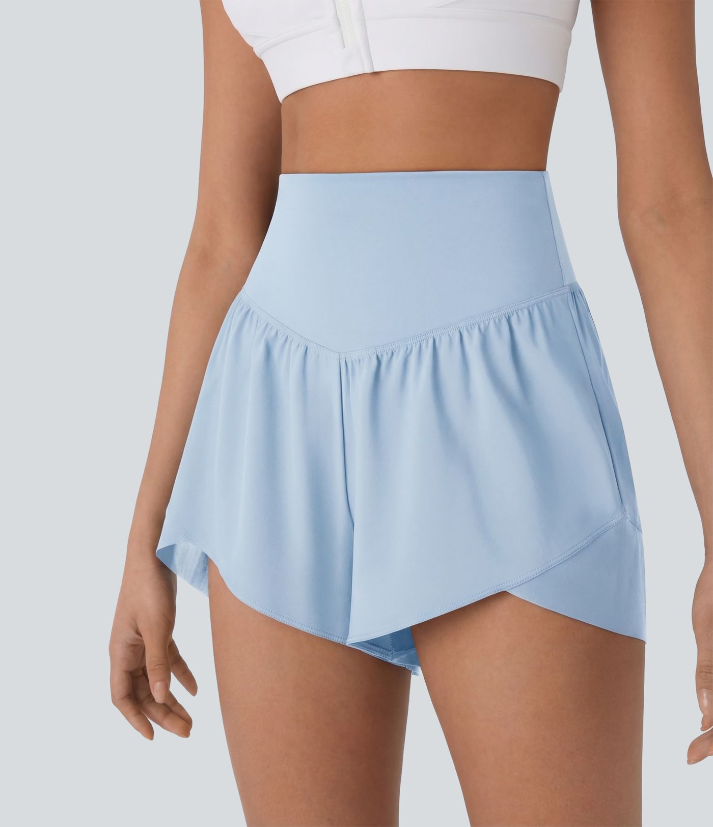 Breezeful™ Short yoga taille haute avec poche arrière ourlet croisé séchage rapide