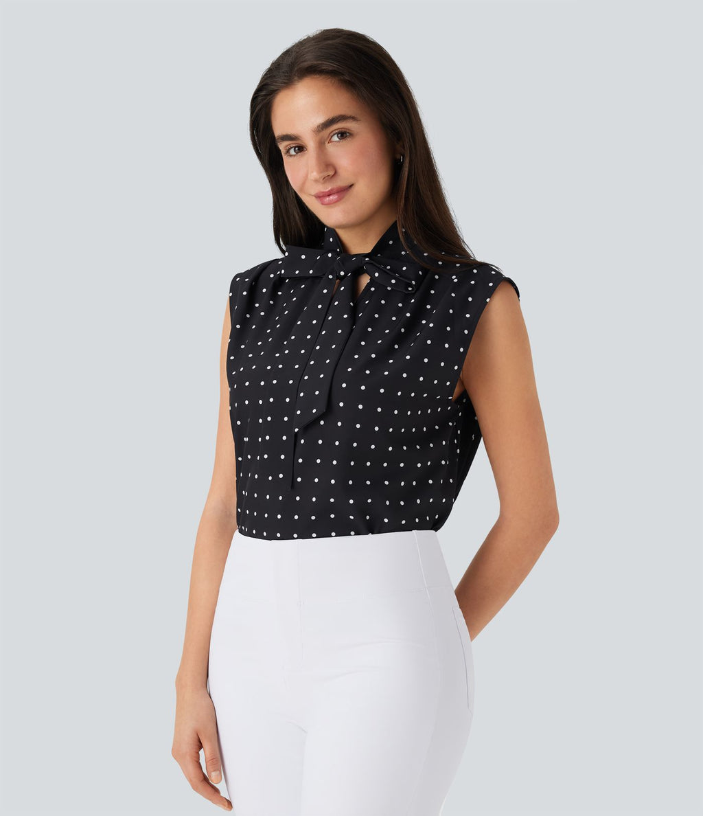 Chemise de travail sans manches à pois avec nœud devant