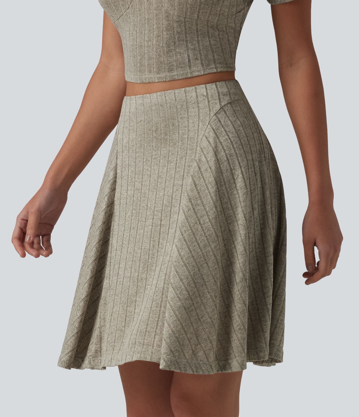 Jupe mini évasée casual 2 en 1 en maille côtelée taille haute avec poches