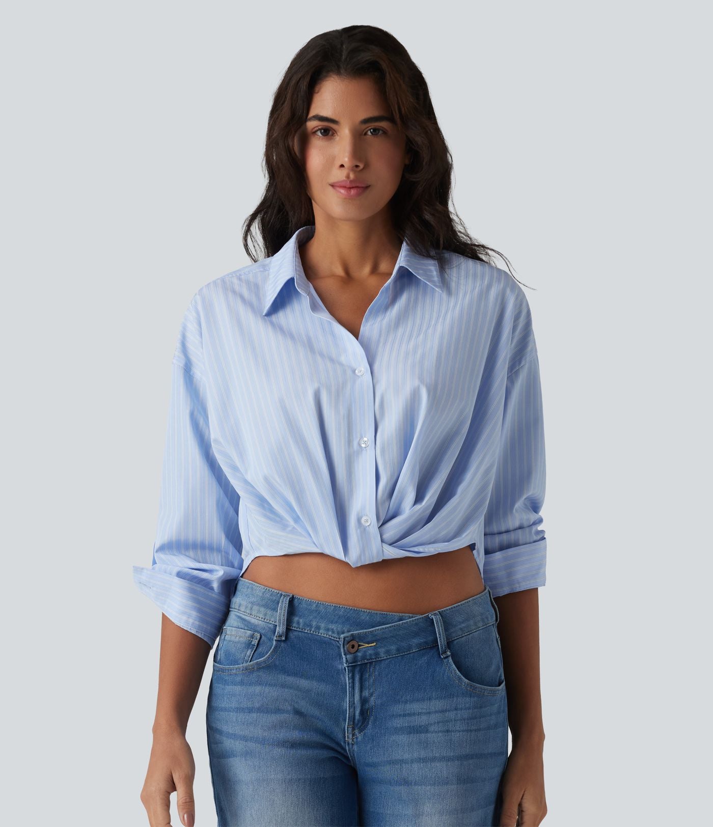 Chemise casual col manches retroussées torsadée asymétrique à rayures