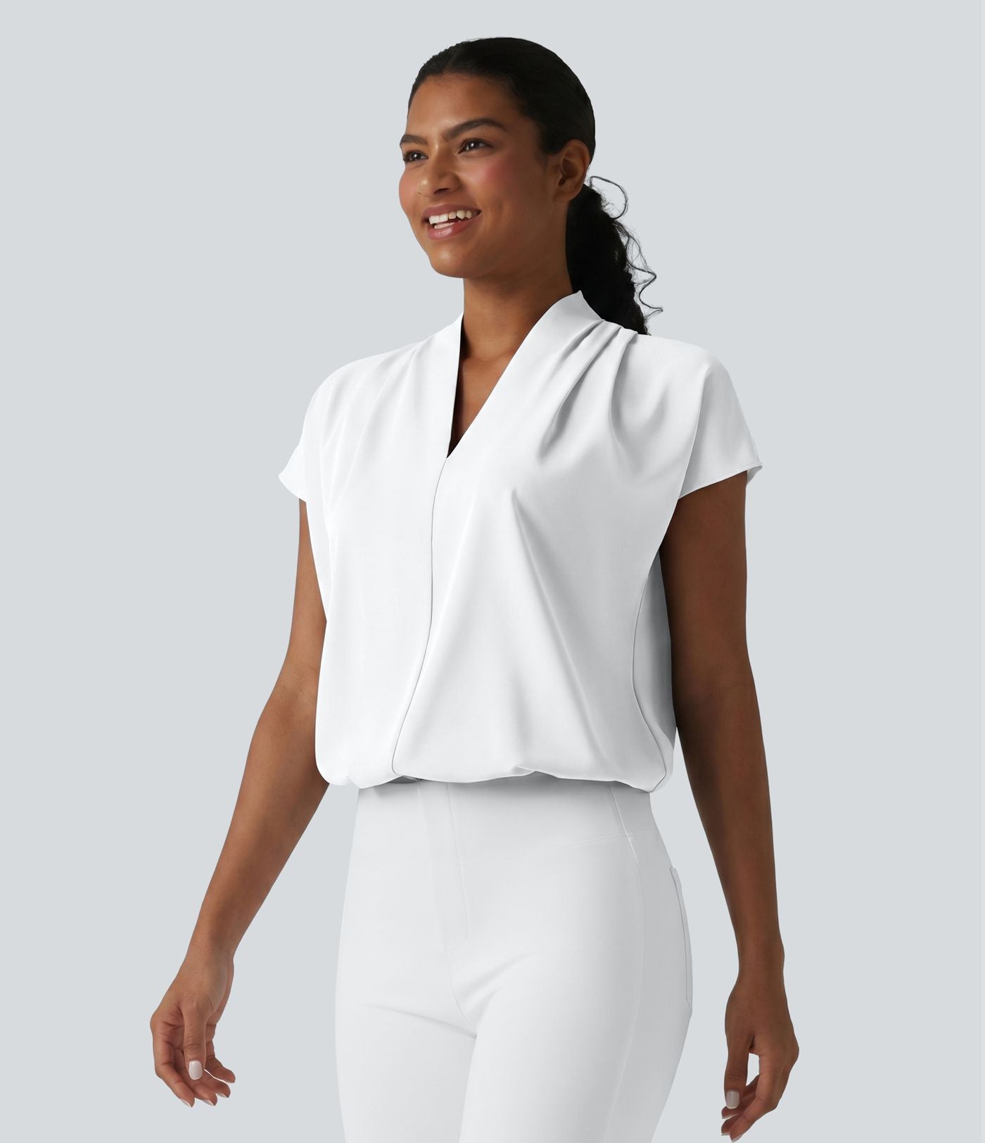 Blouse esprit bureau ample défroissage facile, col V et manches chauve-souris