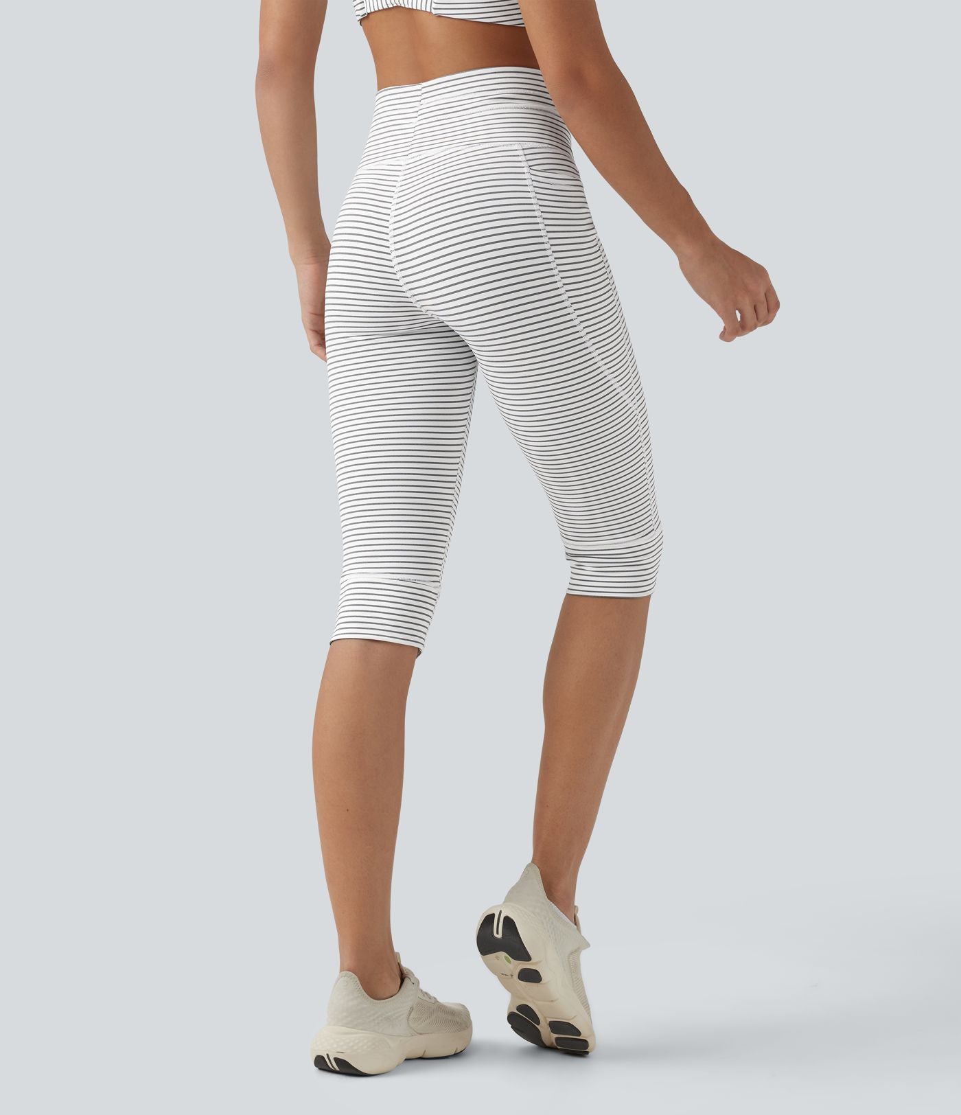 Legging 3/4 de yoga taille haute à rayures avec cordon de serrage et poches