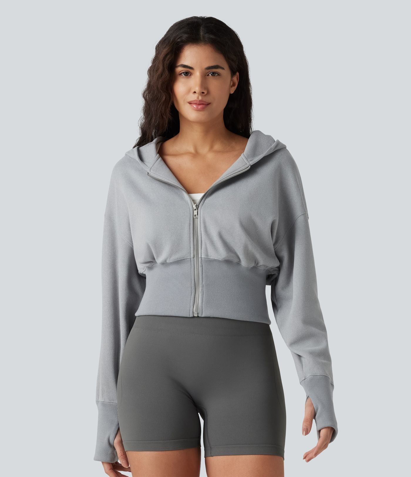 Sweat à capuche zippé avec manches raglan et passe-pouces