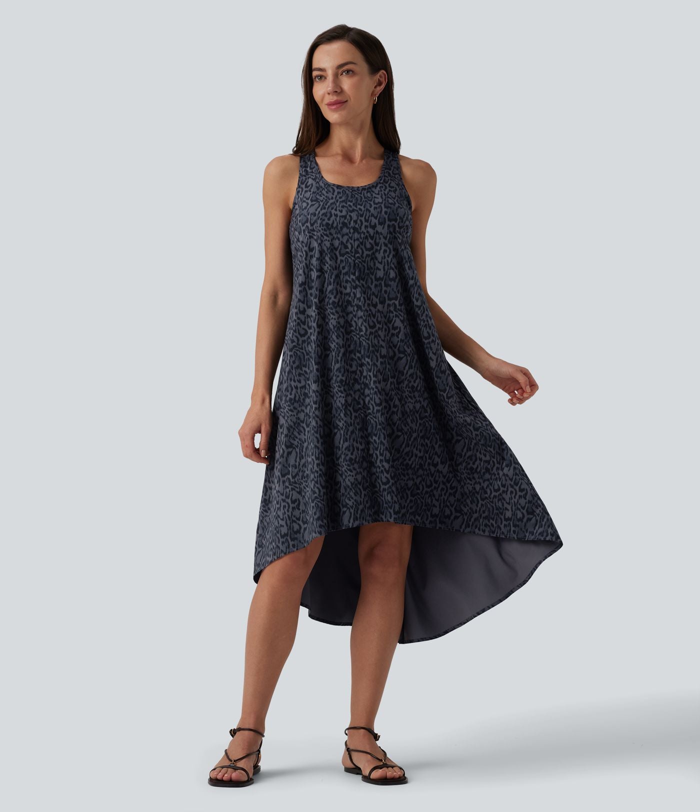Robe mi-longue fluide station balnéaire dos nageur sans manches asymétrique imprimé léopard avec poches