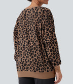 Sweat décontracté oversized col rond manches longues maille gaufrée léopard avec poches