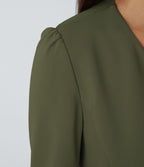 Blazer tailleur ajusté à col rond, manches longues avec boutons décoratifs