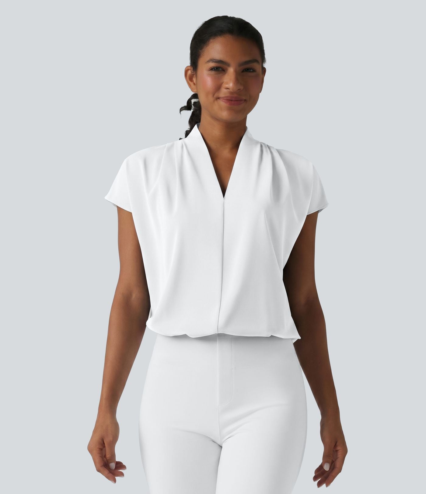 Blouse esprit bureau ample défroissage facile, col V et manches chauve-souris