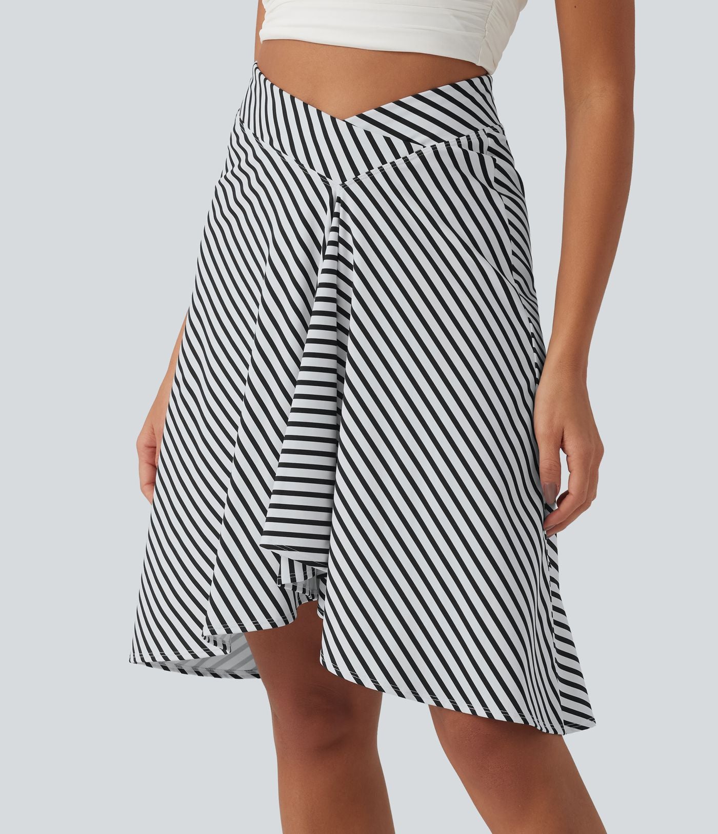 Jupe resort taille haute croisée ourlet asymétrique