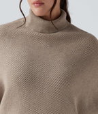 Pull grande taille col montant manches longues à ourlet asymétrique