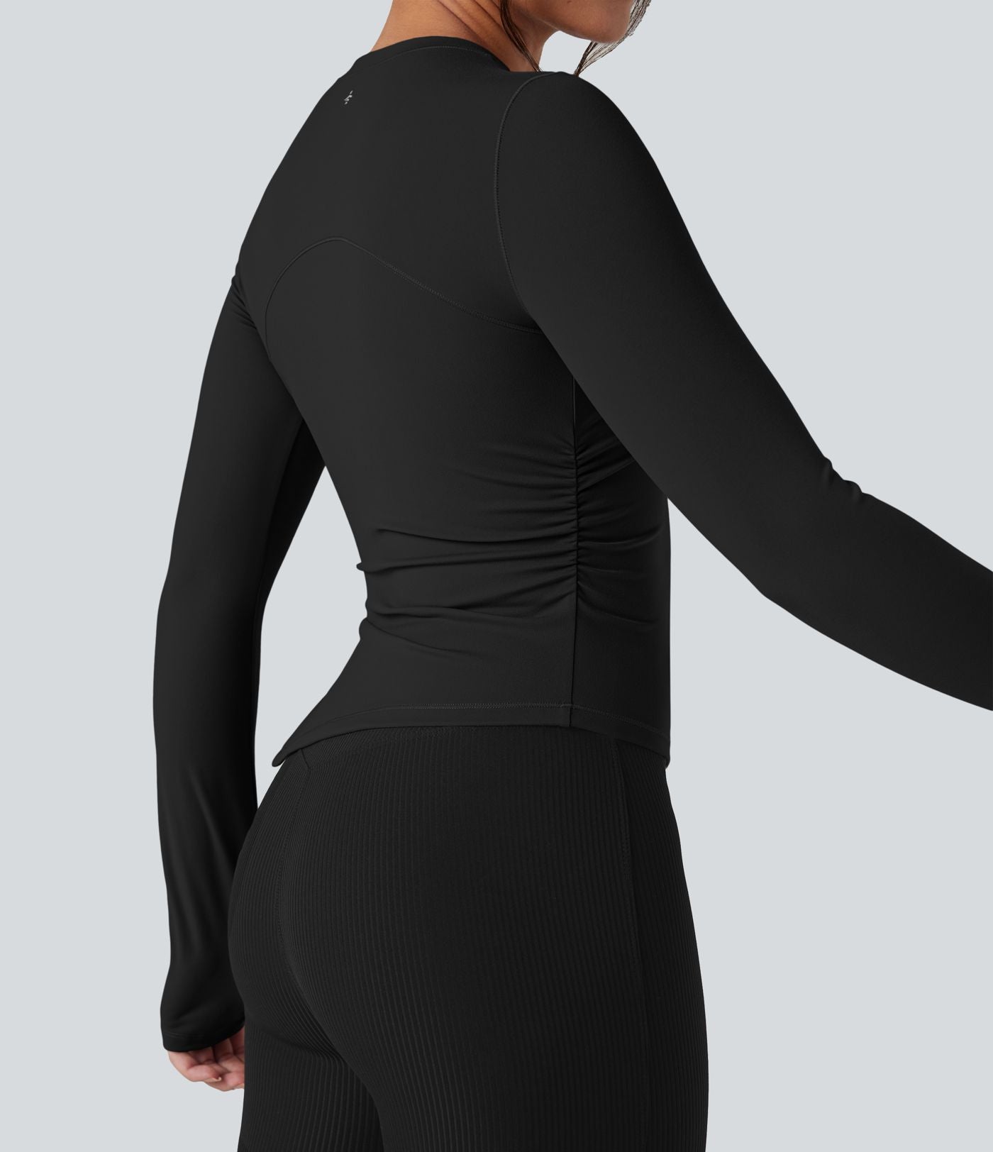 Top de sport yoga col rond ourlet asymétrique fendu manches longues avec trous pouces