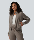 Veste casual côtelée à col montant, manches longues et fermeture zippée avec poches