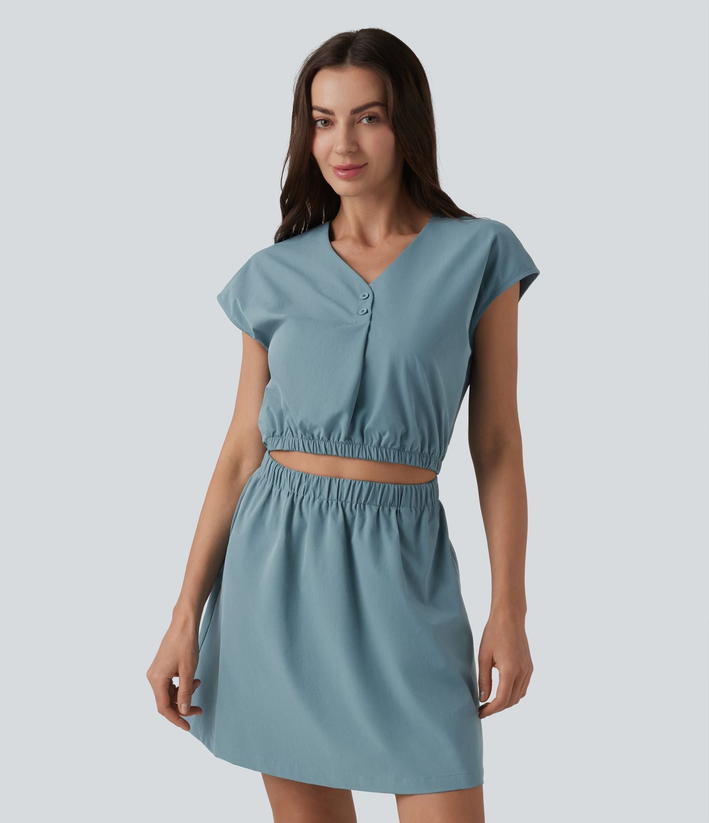 Robe col V manches courtes à découpes en popeline extensible avec poches