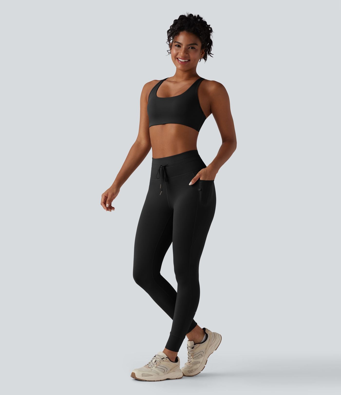 Legging 7/8 de yoga taille haute avec cordon de serrage uni et poches