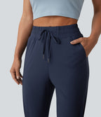 Jogging running taille mi-haute à cordon de serrage avec poches