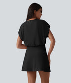 Robe de sport mini de yoga SoftlyZero™ Airy 2-en-1 effet frais InstantCool col rond à manches courtes, demi-zip et poches, accès facile Easy Peasy