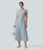 Robe longue fluide casual aspect lin col bateau sans manches à carreaux avec poches