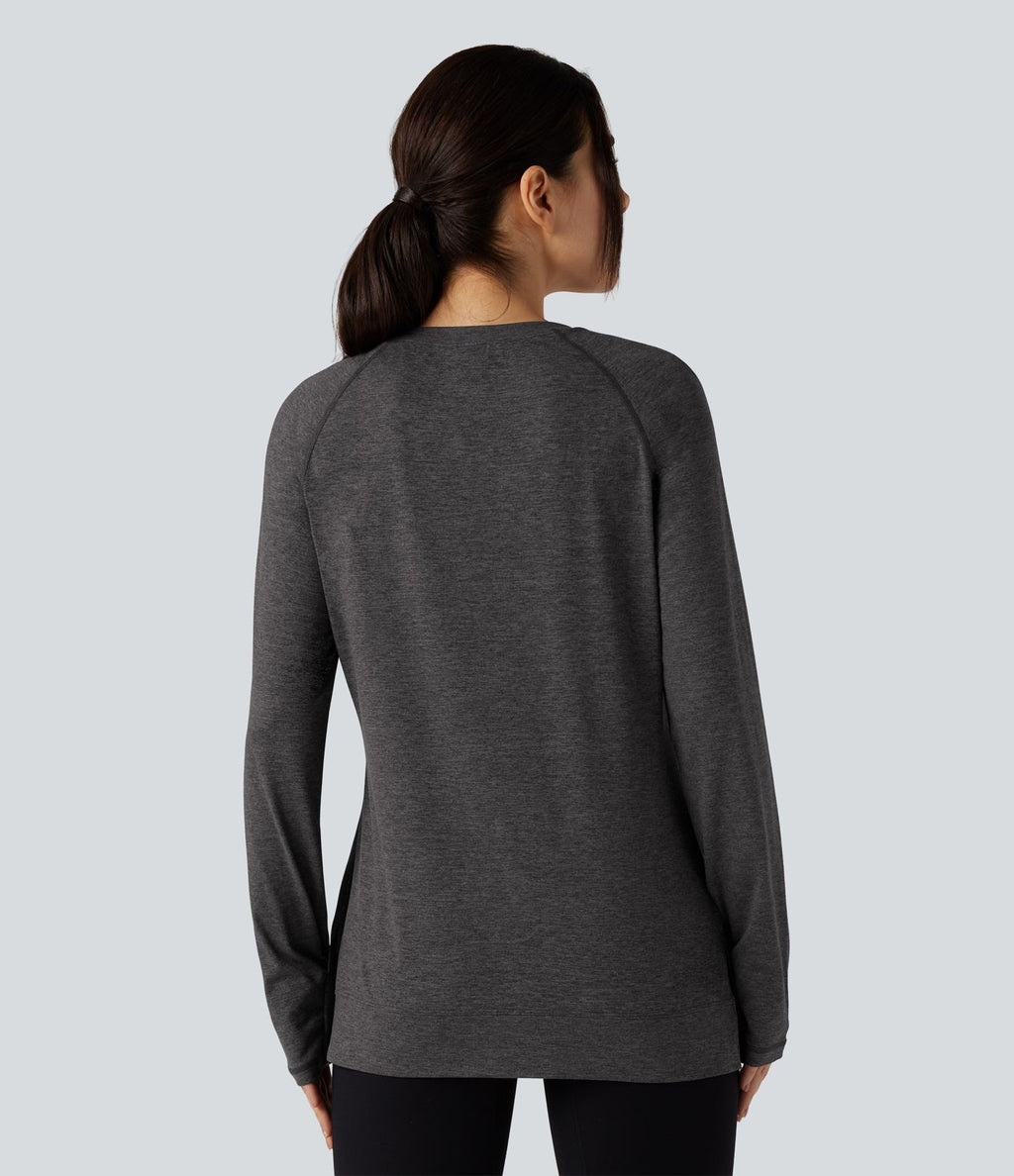 T-shirt doux col rond ourlet fendu manches raglan longues