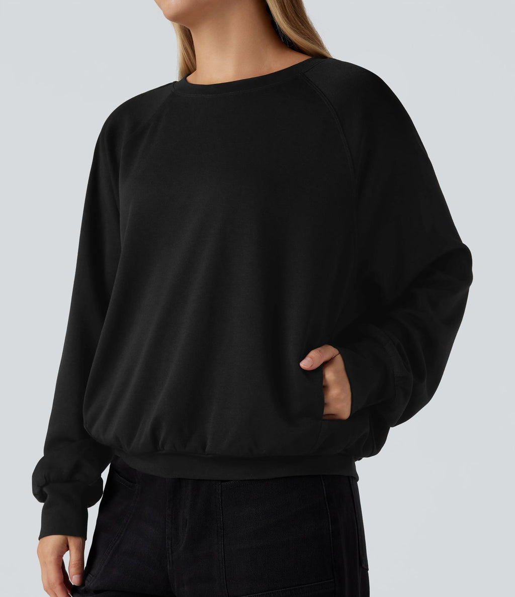 Sweat-shirt col rond manches longues à découpes avec poches