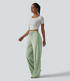 Pantalon large fluide en lin stretch taille haute avec cordon de serrage et poches