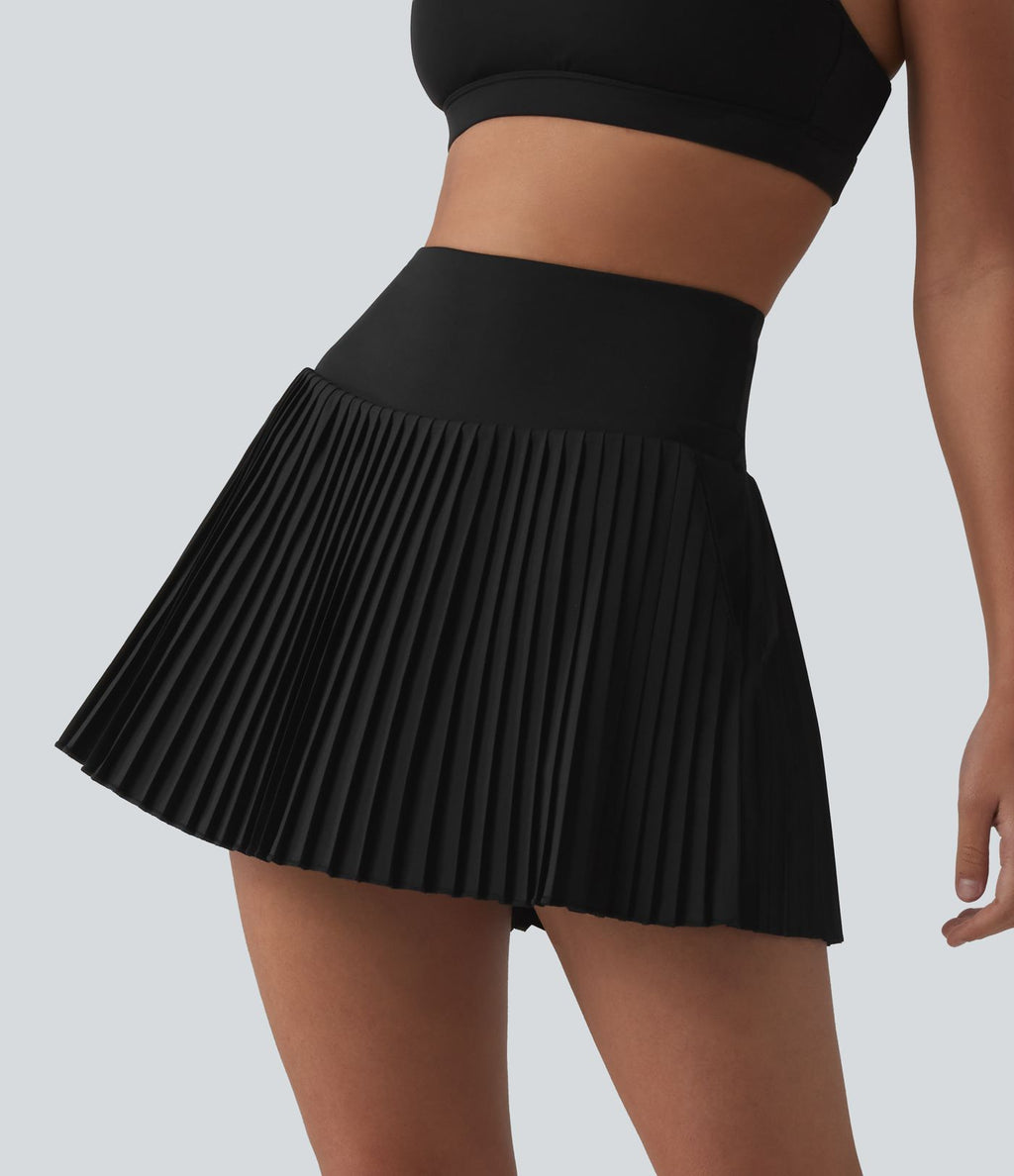 Breezeful™ Jupe mini de tennis plissée 2 en 1 taille haute séchage rapide avec poches