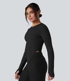 Top de sport yoga col rond ourlet asymétrique fendu manches longues avec trous pouces