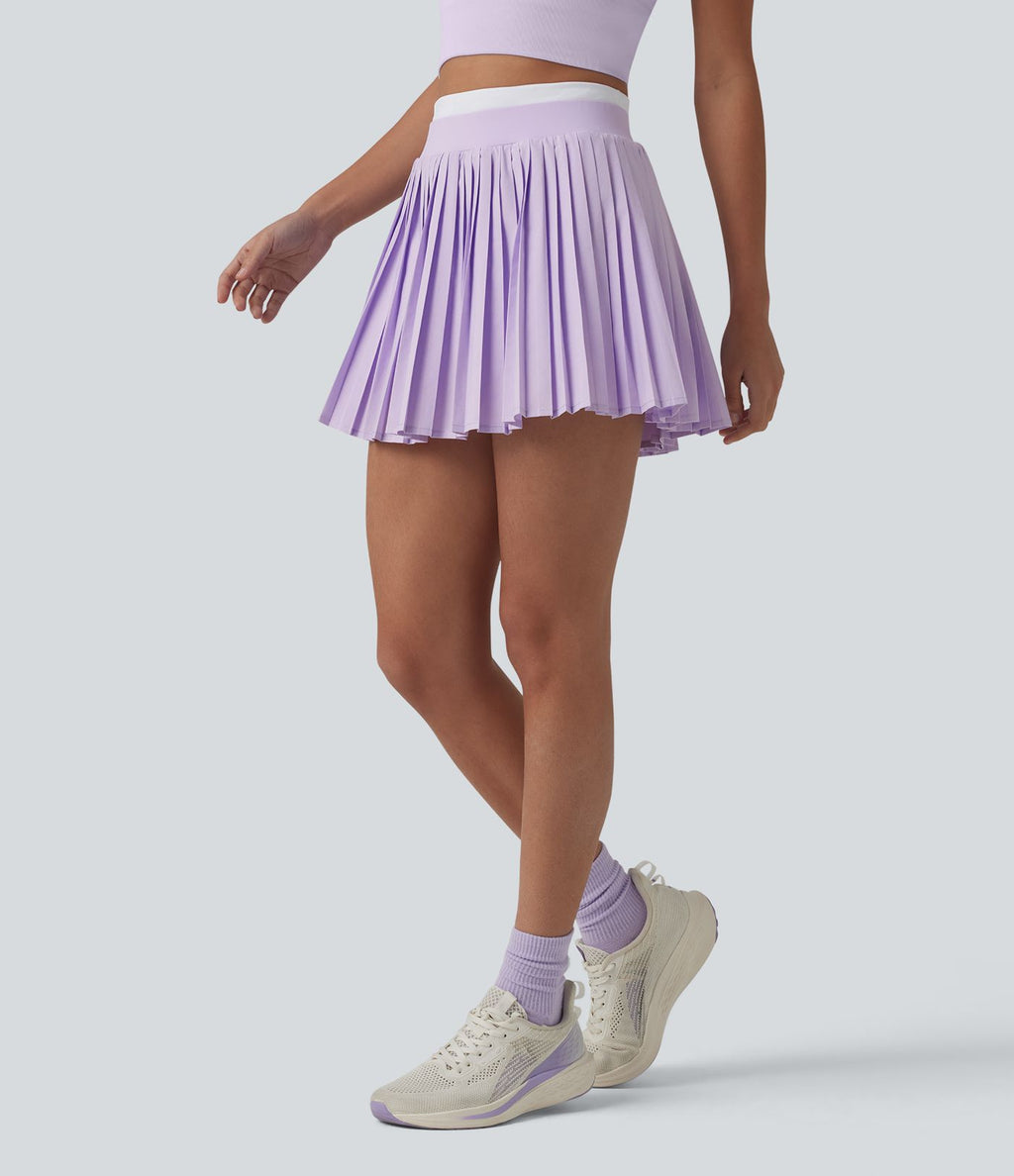 Jupe mini de tennis plissée 2-en-1 Breezeful™ color block taille haute à séchage rapide avec poches