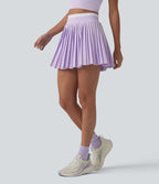 Jupe mini de tennis plissée 2-en-1 Breezeful™ color block taille haute à séchage rapide avec poches