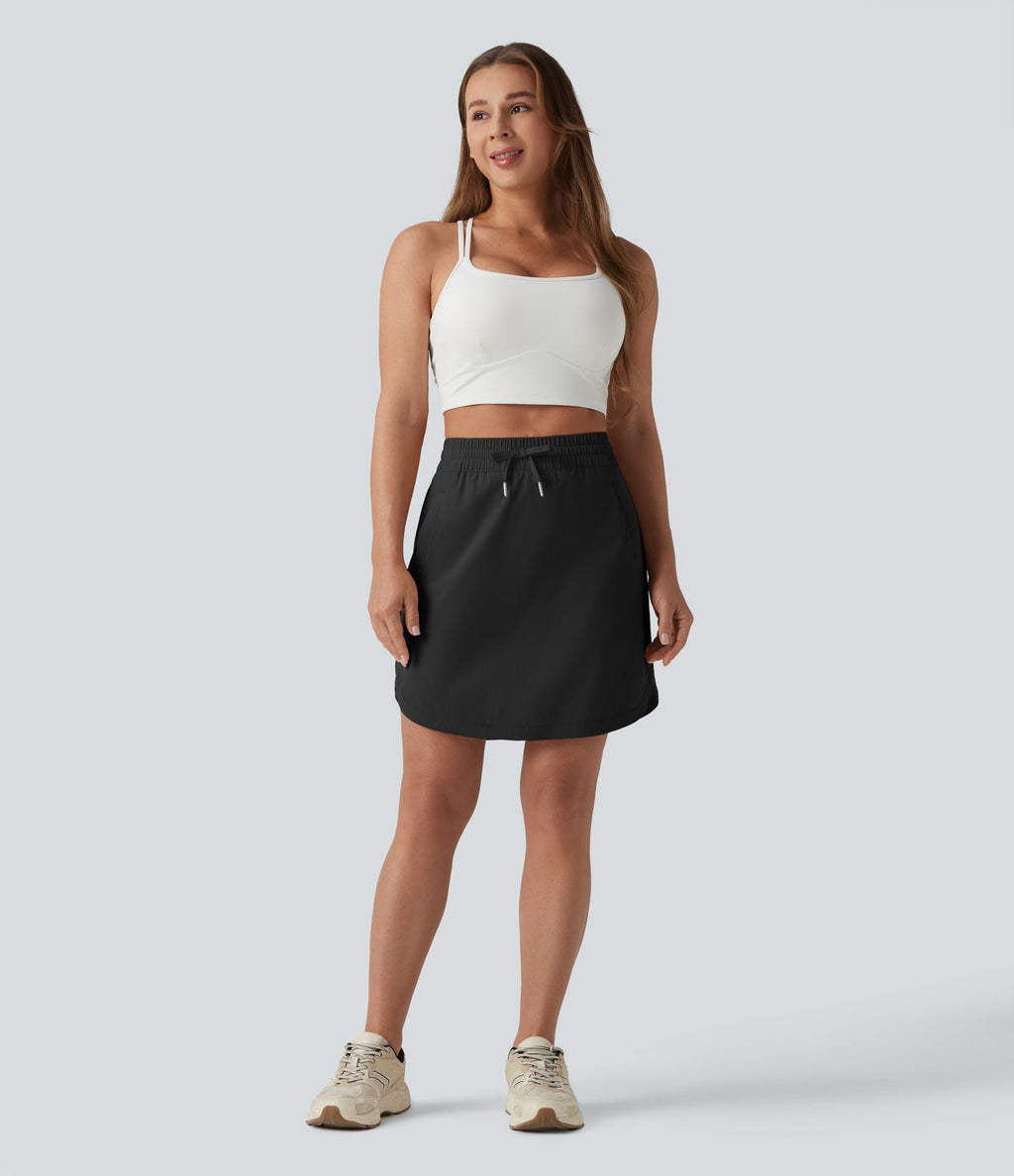 Jupe-short golf mini 2-en-1 taille haute à cordon de serrage et ourlet arrondi avec poches - Longueur plus longue