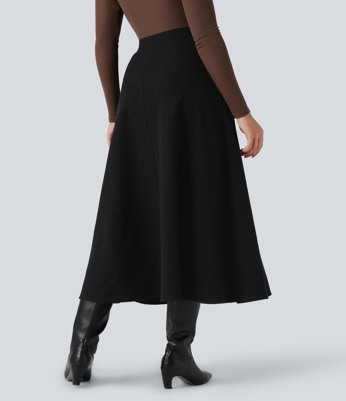 Jupe mi-longue évasée polaire taille haute avec poches