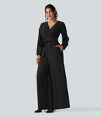 Combinaison pantalon de soirée large à décolleté en V, manches longues bouffantes, ceinture et poches