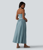 Robe longue fluide dos nu avec tour de cou, brassière intégrée et poches