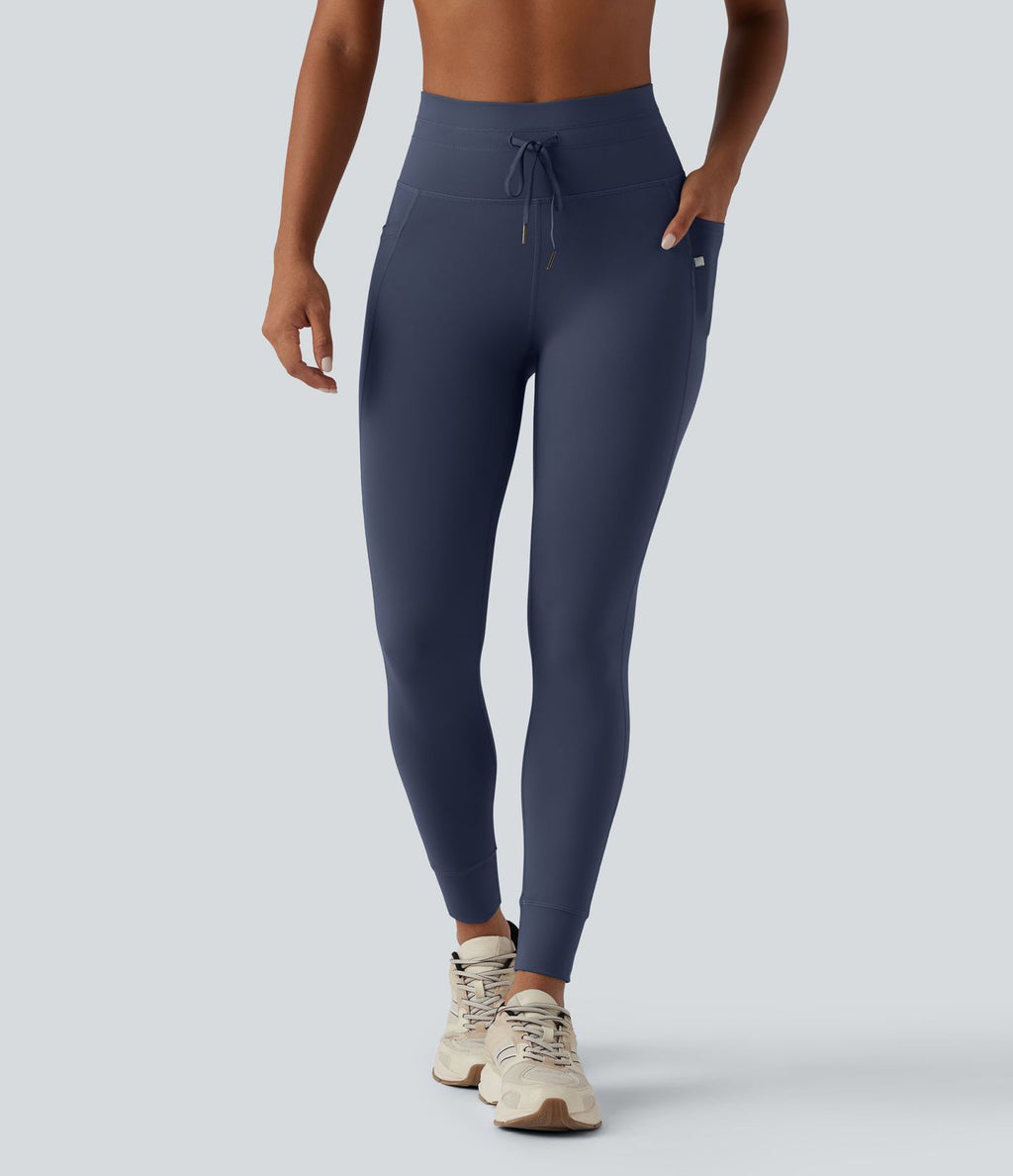 Legging 7/8 de yoga taille haute avec cordon de serrage uni et poches