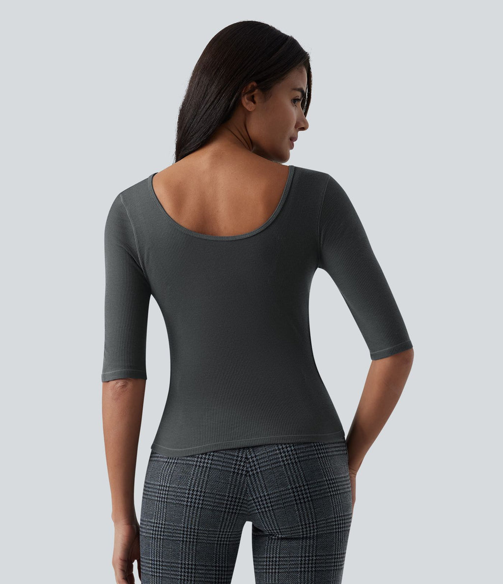 Top tailleur en mélange de laine col rond échancré à manches courtes en maille côtelée