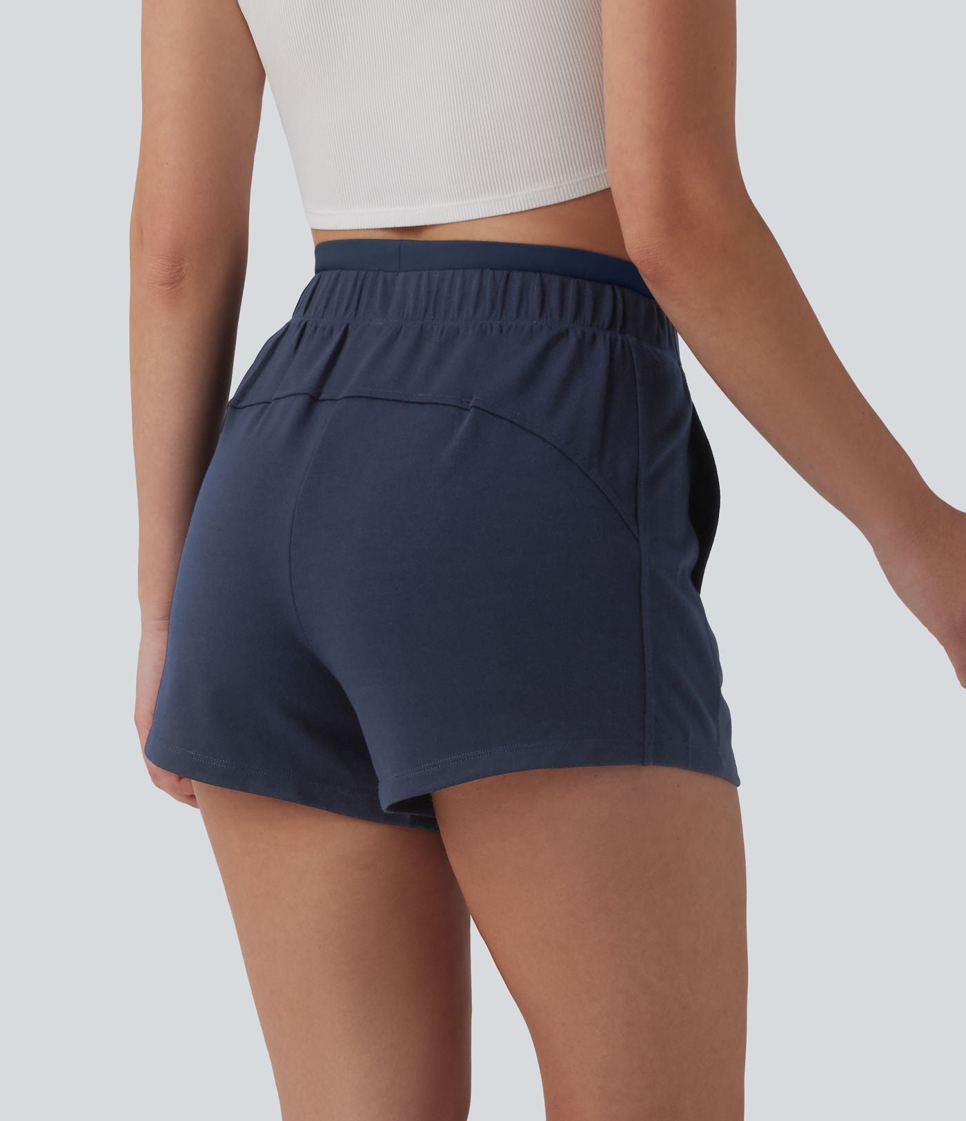 Short sweat décontracté 2 en 1 taille haute 10 cm avec poches