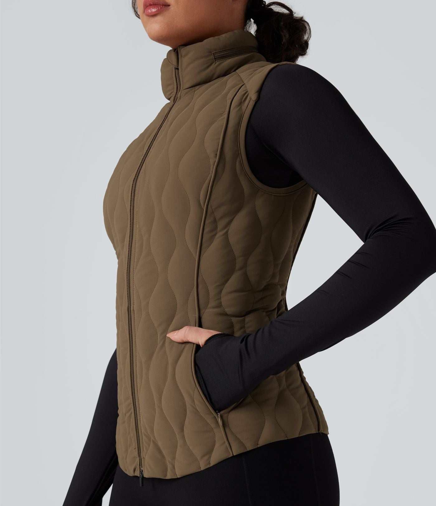 Gilet matelassé running PuffFlex col montant avec zip pliable avec poches