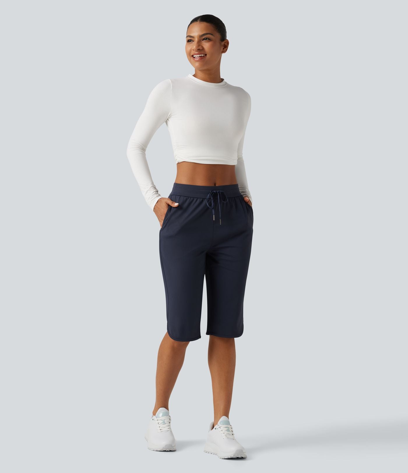 Pantacourt de golf taille mi-haute à séchage rapide avec cordon de serrage, ourlet arrondi, poches et protection solaire UPF40+