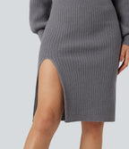 Robe pull mi-longue moulante fendue col V manches chauve-souris longues