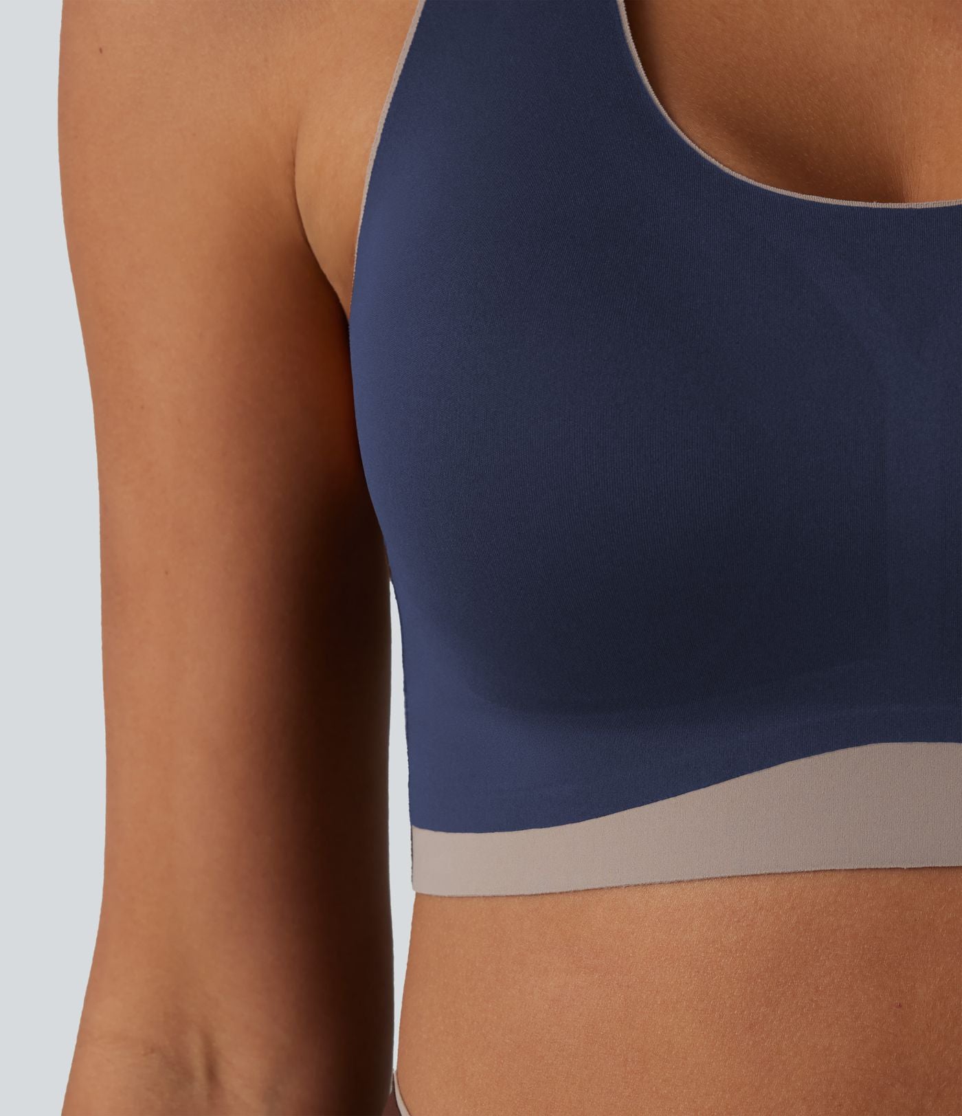 Brassière de sport maintien léger col U dos nageur color block avec soutien-gorge intégré